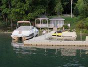 View dock and family boat from the water