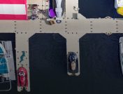 Birdseye view of dock with motor boats and jet skis