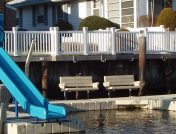 Residential dock with sliding board
