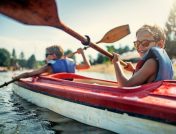 Two young boys kayaking