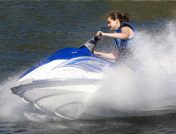 Girl on blue jet ski