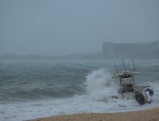 Boat on beach during storm