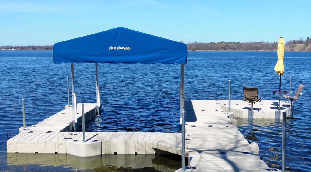 Floating dock with outdoor furniture and awning