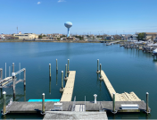 View of dock with blue water tower