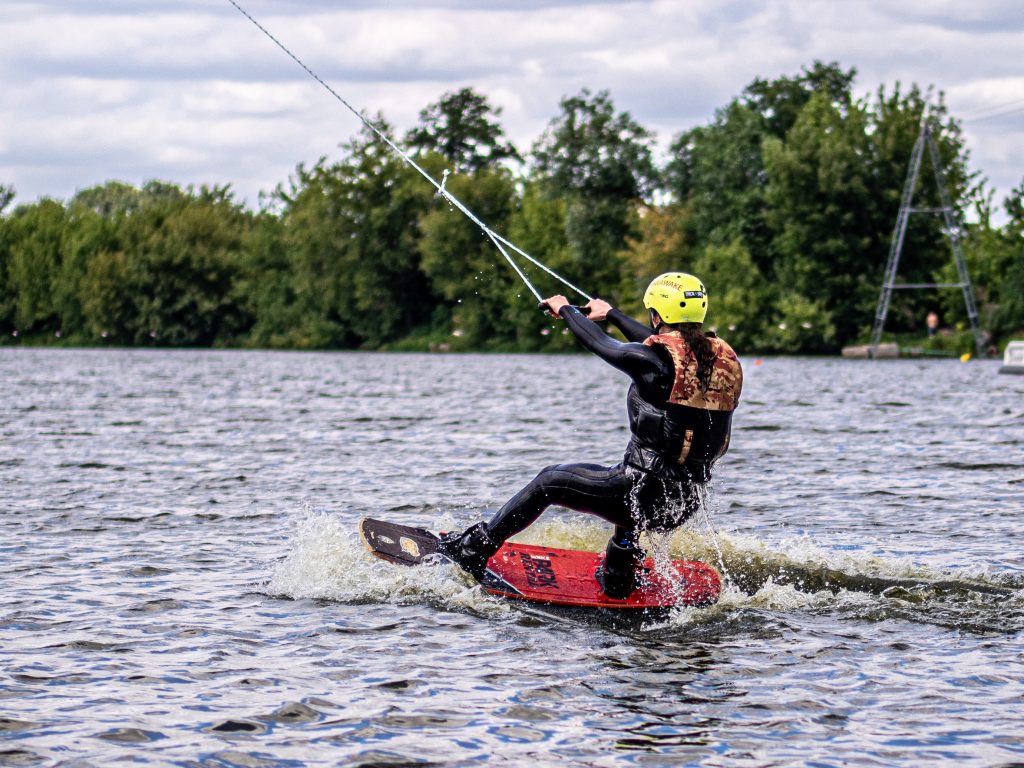 Man wakeboarding in a lake