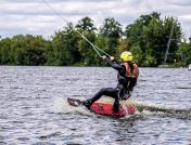 Man wakeboarding in a lake