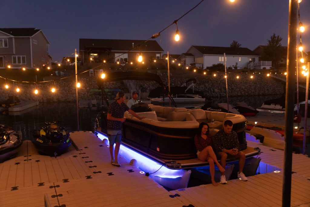 People Hanging out on dock and boat