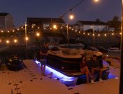 People Hanging out on dock and boat